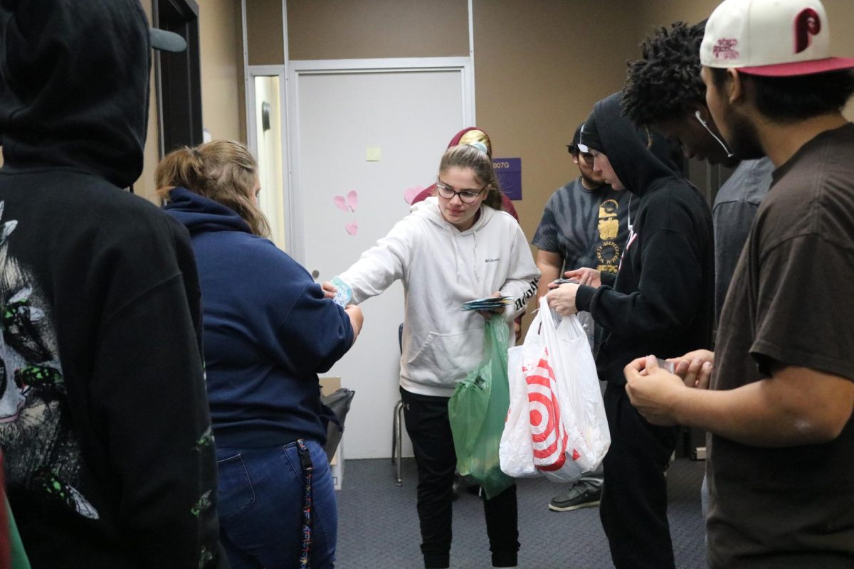 iJAG preparing bags for the weekend food program.