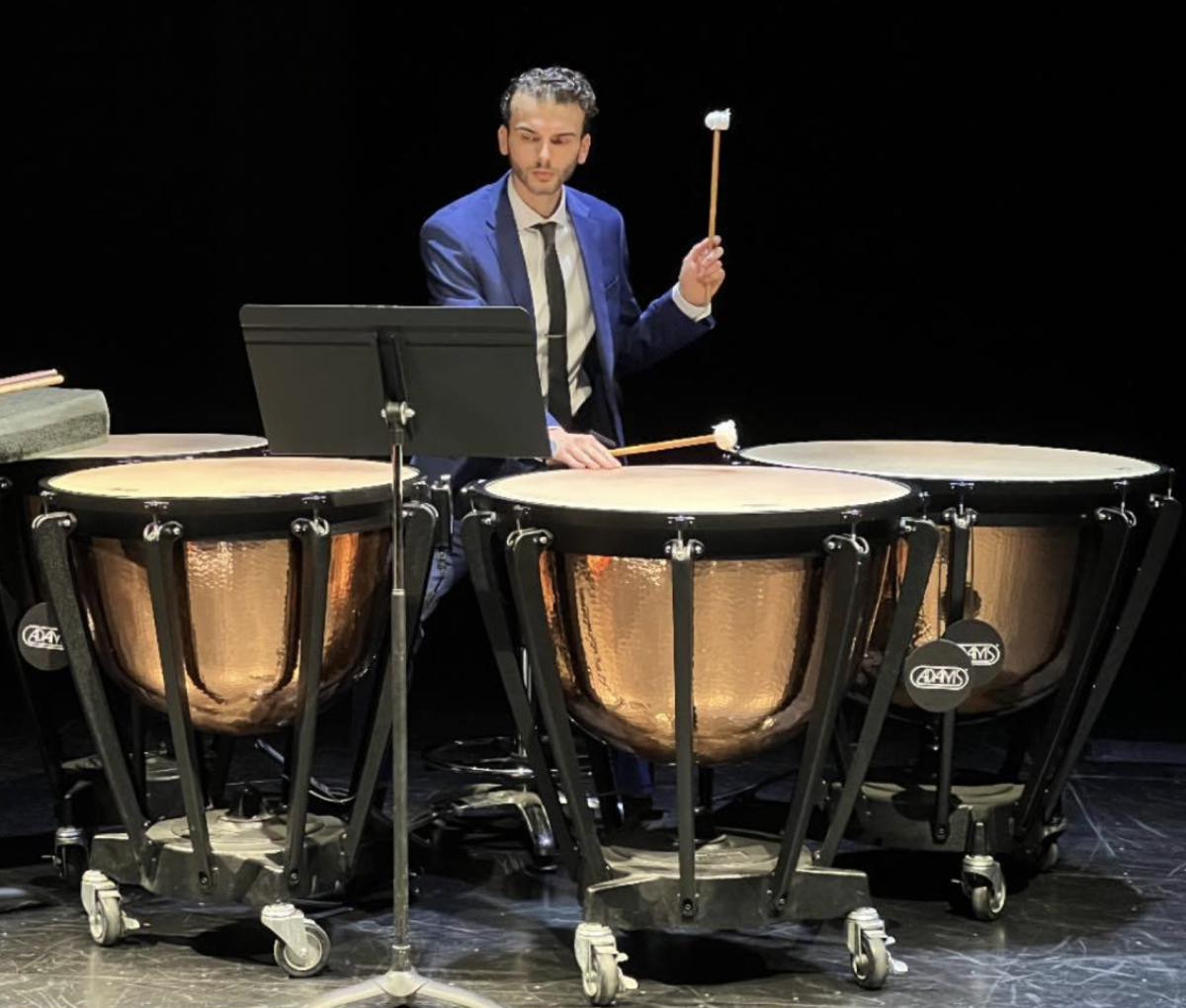 Mr.O'Shaugnessy playing the Timpani